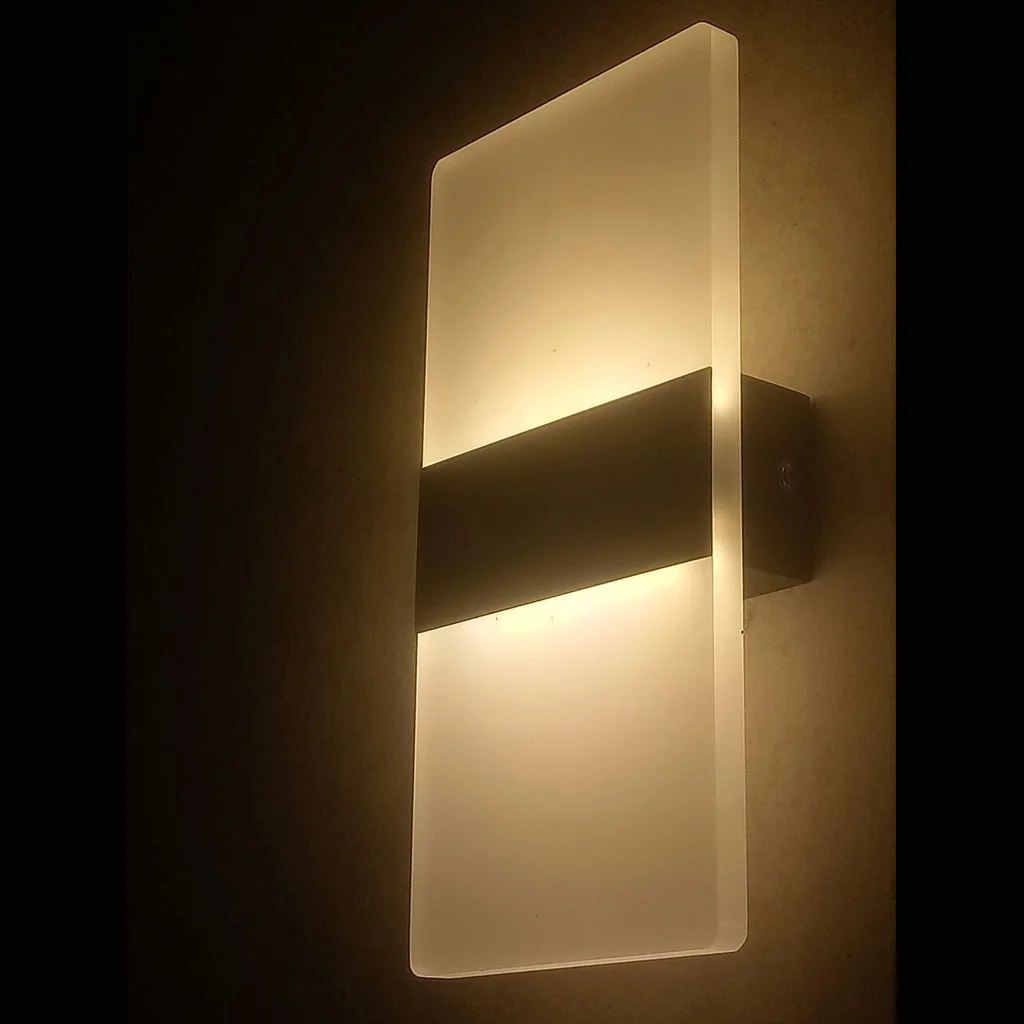 Glow panel wall sconce lit warm